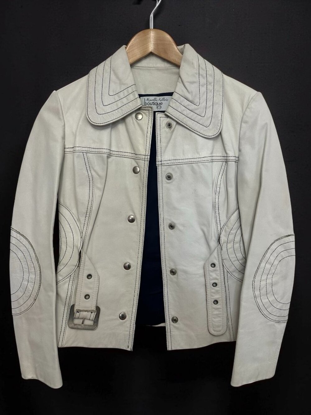 One of a kind Vintage Boutique White Leather Jacket with Navy blue stitching.